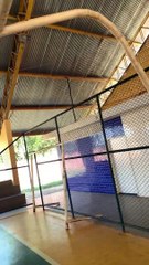 Friend Helps Complete a Dunk Breaking Basket