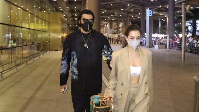 Malaika Arora Returns Mumbai with beau Arjun Kapoor from Paris, Viral Video *Bollywood