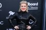 Kelly Clarkson admits it's been "difficult" working on her first new music since her divorce