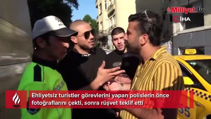 Görevlerini yapan polislerin önce fotoğraflarını çekti, sonra rüşvet teklif etti