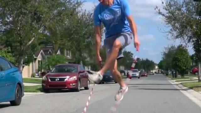 Man Performs Jumprope Tricks on Street