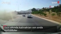 Tırın altında kalmaktan son anda kurtuldular