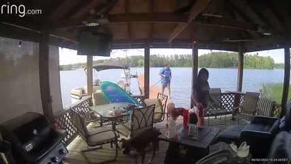 Distracted Man Walks Off Dock