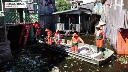 Heavy rains exacerbate trash problem in Brazil's Manaus