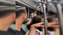Metrobüste genç kadının fotoğrafını çekerken yakayı ele verdi