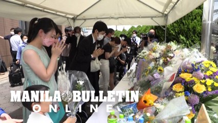 Mourners in Japan place flowers for Abe at scene where former PM killed