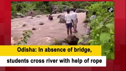 Odisha: In absence of bridge, students cross river with help of rope