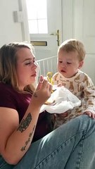 Toddler Steals Food From Mother's Mouth