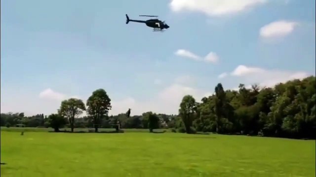 What in gods name is going on here? Wrangling helicopters