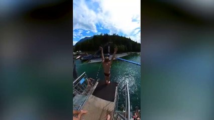 Download Video: MAKING A SPLASH - This amazing video shows a talented teenager diver making a splash with an incredible 15m (50ft) dive from a springboard