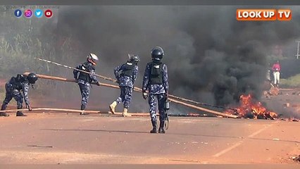 Ugandan police arrest eight protesting over the high living cost