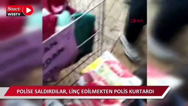 Polise saldırdılar, linç edilmekten polis kurtardı
