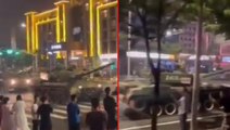 Banka krizi Çin'i felakete sürüklüyor! Güvenlik güçleriyle çıkan arbede sonrası şube önüne tanklar konuşlandırıldı