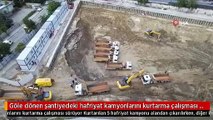 Göle dönen şantiyedeki hafriyat kamyonlarını kurtarma çalışması sürüyor