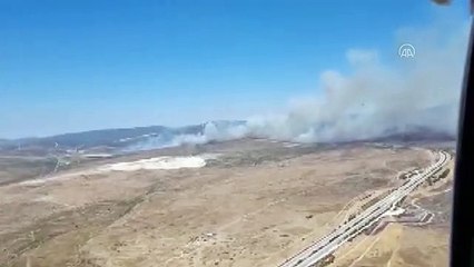 Download Video: Çeşme'de makilik alanda çıkan yangına müdahale ediliyor