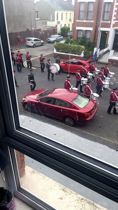 Marching Band Retaliates After Man Throws Garbage Bin