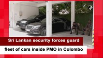 Sri Lankan security forces guard fleet of cars inside PMO in Colombo