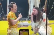 Happy birthday Mitch! Harry Styles surprises guitarist with cake at Budapest concert