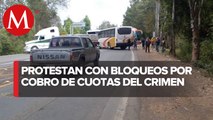 Pobladores bloquean carreteras para pedir un alto a la inseguridad en Michoacán