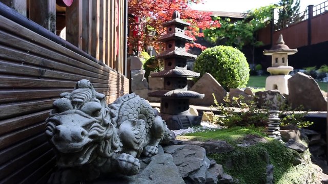 Inside the Japanese garden in the backyard of a terraced home