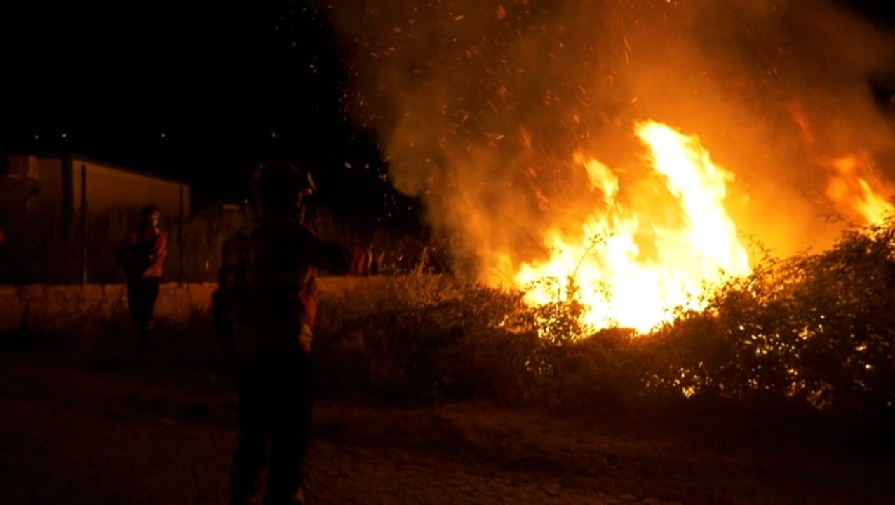 Firefighters battle flames through the night in Portugal