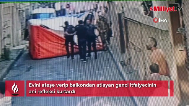 Evini ateşe verip balkondan atlayan genci itfaiyecinin ani refleksi kurtardı