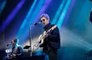 Noel Gallagher sings through straws to help warm up his voice