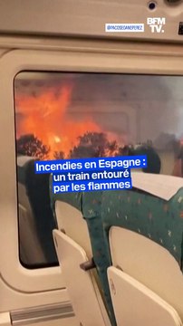 Incendies en Espagne: un train entouré par les flammes