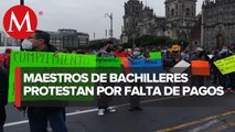 Docentes de Michoacán exigen mejoras laborales frente a Palacio Nacional