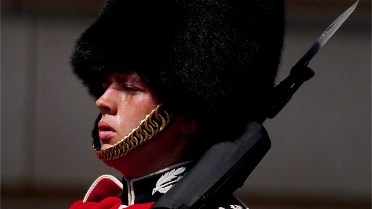 The public in uproar as the Queen’s guards forc...