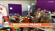 France's evacuated residents help firefighters at crisis centre in southwest