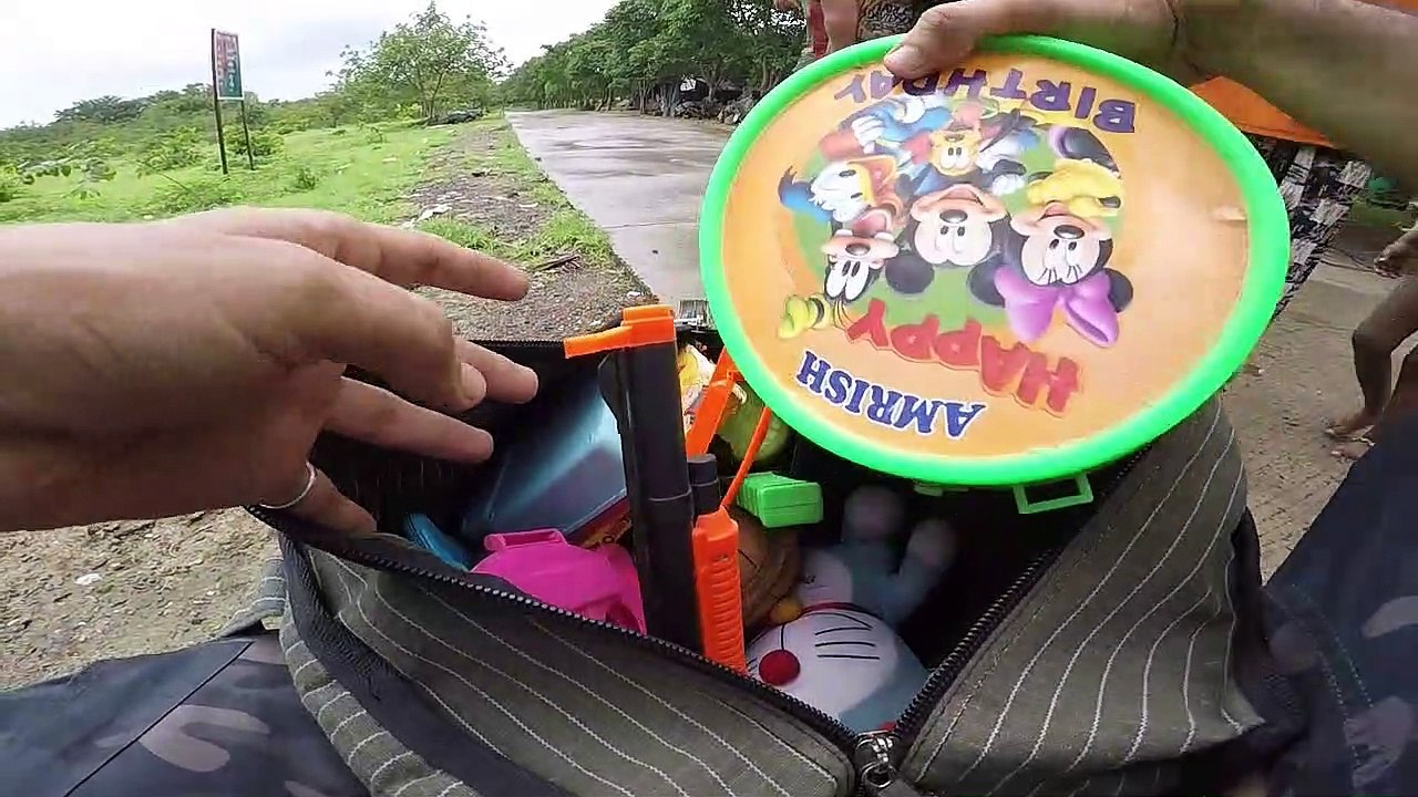 Rajkot Toy donation drive at construction site poor kids during monsoon for their happiness