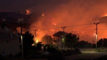 Wildfires force hundreds to flee in Greece as heat wave ravages Europe