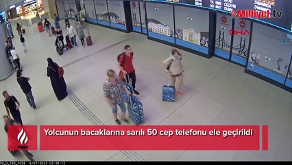 Download Video: Yolcunun bacaklarına sarılı 50 cep telefonu ele geçirildi