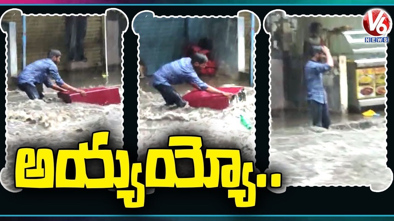 Man Trying To Stop Things Getting Washed Away In Flood | Ameerpet | V6 News