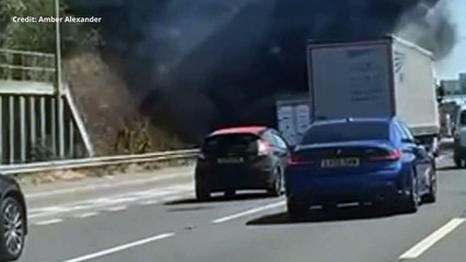 A van and shrubland is alight on the side of the A2 carriageway in Dartford