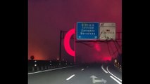 بزرگراهی در اسپانیا در محاصره شعله‌های آتش از دریچه دوربین یک سرنشین خودرو