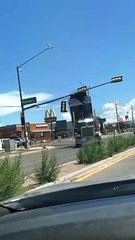 Semi-Truck Gets Stuck on Traffic Light Pole