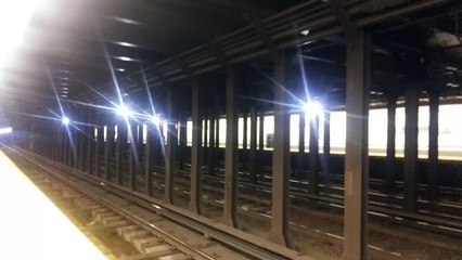 N  Q and R Trains pass each other in Manhattan