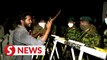 Sri Lankan forces raid anti-gov't protest camp as new president takes office