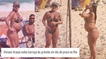 Aos 8 meses, Viviane Araujo exibe barriga de grávida e se refresca em chuveirão em praia no Rio. Fotos!