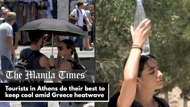 Tourists in Athens do their best to keep cool amid Greece heatwave