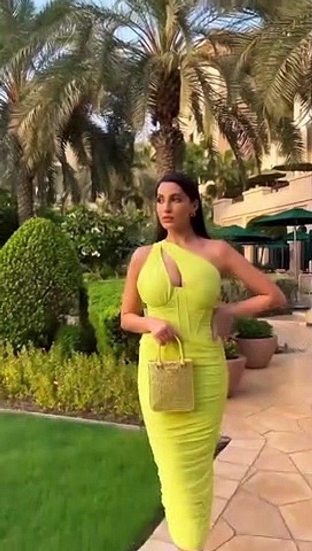 Nora Fatehi looks hot in a neon green bodycon dress