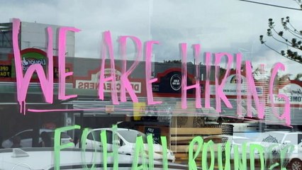 Brisbane barbershop forced to fly workers from interstate because it can't find staff