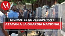 Migrantes se enfrentan con Guardia Nacional exigen visas para transitar por el país