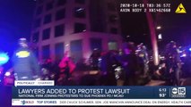 Lawyers added to protest lawsuit