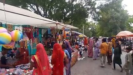Punishment fair on the fort, people gathered at delightful places