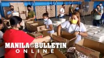 Volunteers repacked reliefs at the DSWD prior to the areas affected by the earthquake
