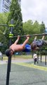 Strength And Conditioning Educator And Kid Hold Bar While Balancing in Horizontal Position