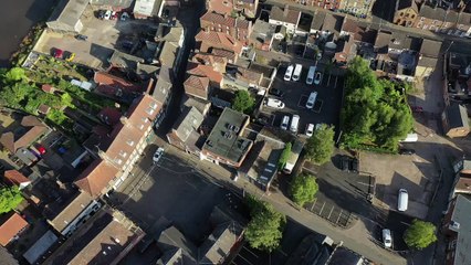 Police forensic experts comb a street in Boston for clues following the murder of a nine-year-old girl